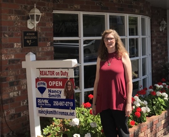Photo of Nancy Smith REALTOR® with clients